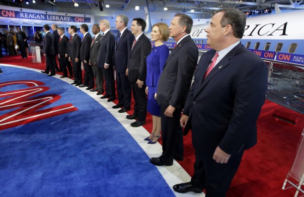 Republican presidential candidates, from left, former Pennsylvania Sen. Rick Santorum, former New York Gov. George Pataki, Sen. Rand Paul, R-Ky., former Arkansas Gov. Mike Huckabee, Sen. Marco Rubio, R-Fla., Sen. Ted Cruz, R-Texas, retired neurosurgeon Ben Carson, businessman Donald Trump, former Florida Gov. Jeb Bush, Wisconsin Gov. Scott Walker, businesswoman Carly Fiorina, Ohio Gov. John Kasich, and New Jersey Gov. Chris Christie take the stage during the CNN Republican presidential debate at the Ronald Reagan Presidential Library and Museum on Wednesday, Sept. 16, 2015, in Simi Valley, Calif. (AP Photo/Chris Carlson)